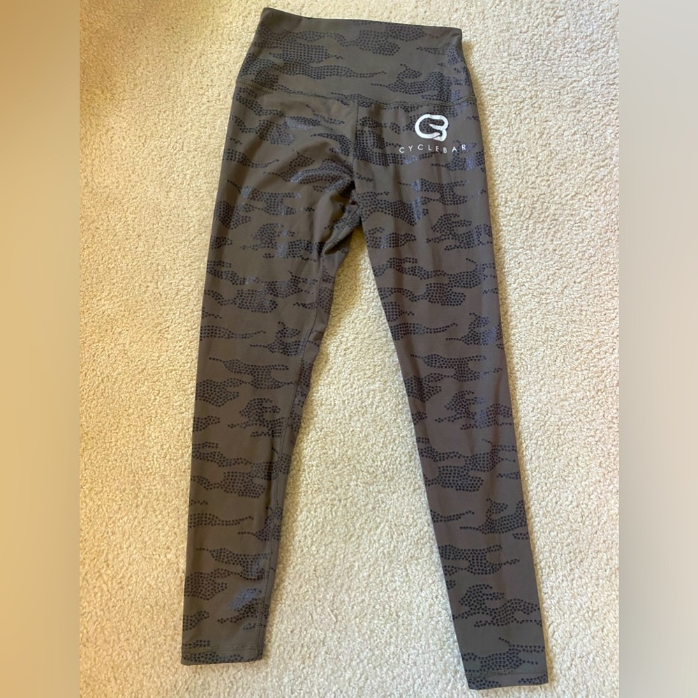 Cyclebar- 7/8 length olive green with semi-shine camo print.